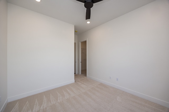 empty room with light colored carpet