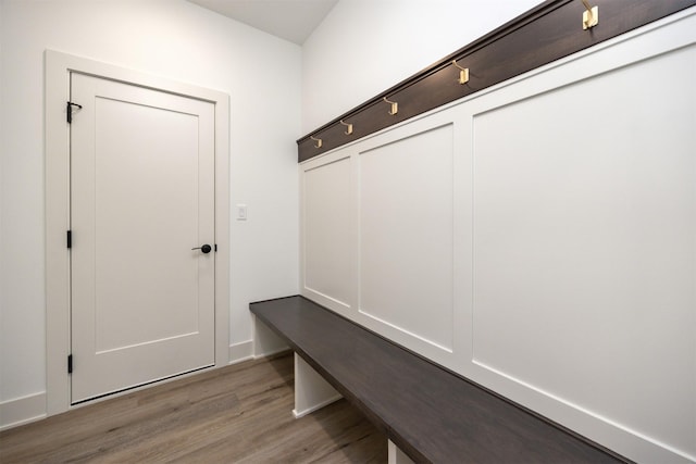 mudroom with wood-type flooring