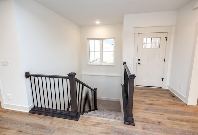 foyer with light wood-type flooring