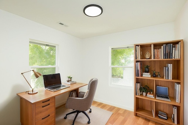 office area with light wood-type flooring