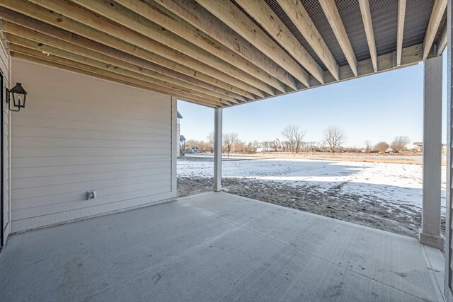 view of snow covered patio