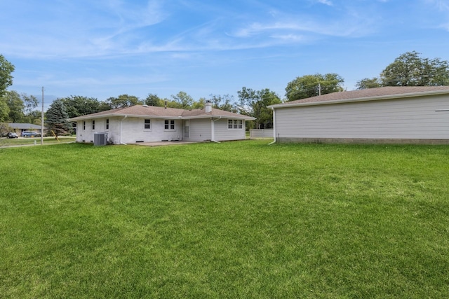 view of yard featuring central AC unit