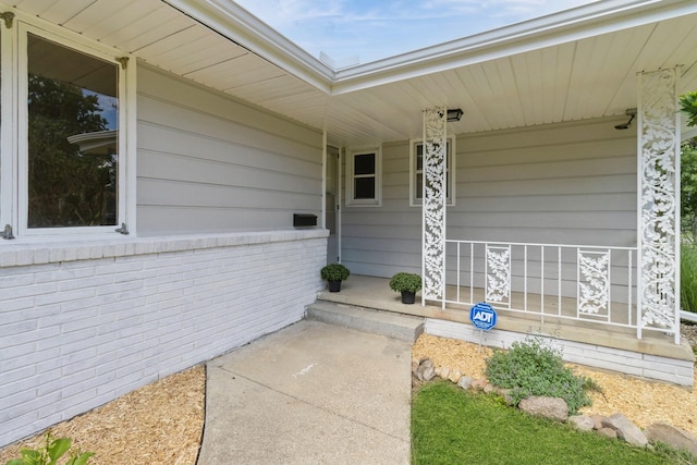 entrance to property with covered porch