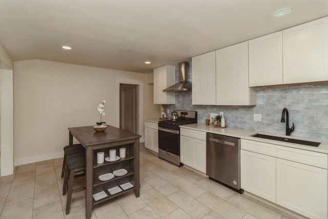 kitchen featuring open shelves, a sink, decorative backsplash, wall chimney exhaust hood, and appliances with stainless steel finishes