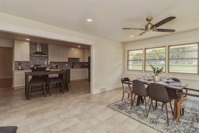 dining space featuring recessed lighting, visible vents, a ceiling fan, light tile patterned flooring, and baseboards