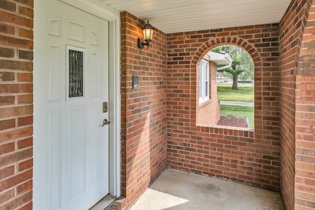 entrance to property with a porch