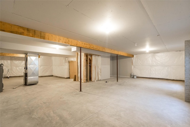 basement featuring heating unit