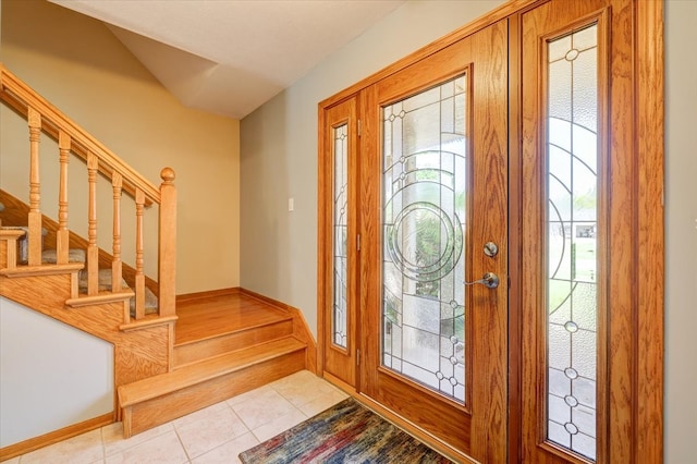 view of tiled foyer entrance