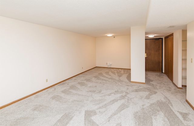 basement with light carpet