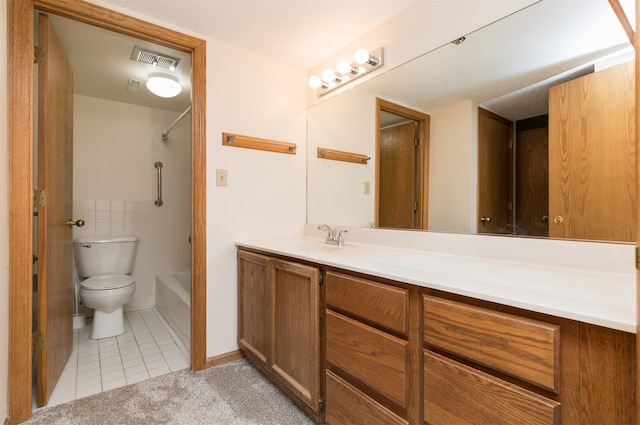 full bathroom with shower / bathing tub combination, tile patterned floors, vanity, and toilet