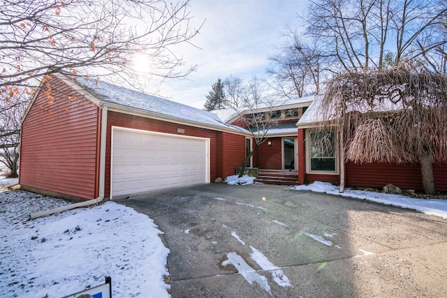 view of front of home with a garage