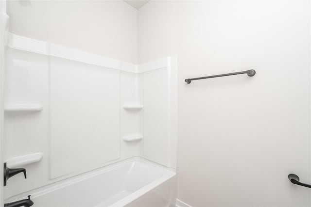 bathroom with shower / tub combination