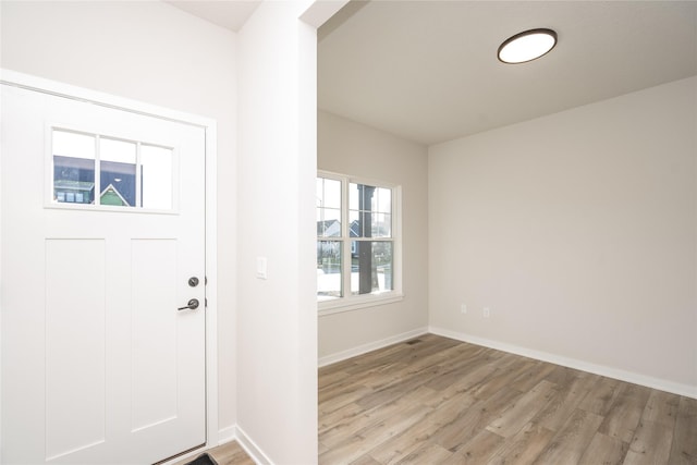 foyer entrance featuring light hardwood / wood-style flooring