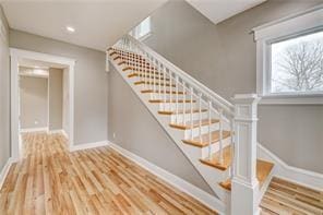 staircase featuring hardwood / wood-style floors