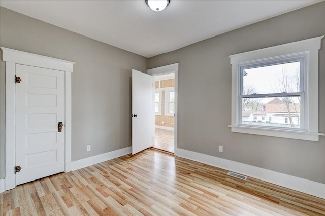 unfurnished bedroom featuring light hardwood / wood-style floors