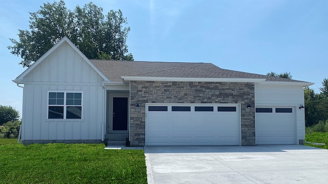 ranch-style house with a garage and a front yard