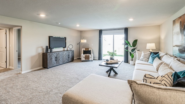 living room with carpet and a textured ceiling