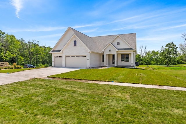 view of front facade with a front lawn and a garage