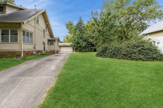 view of yard featuring a garage