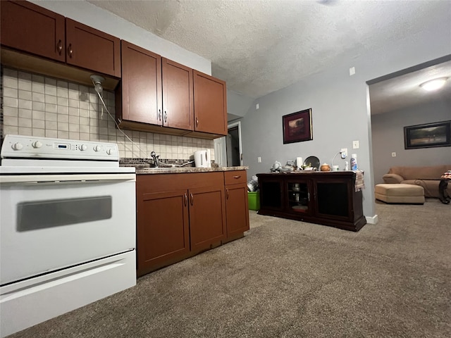 kitchen with carpet floors, a textured ceiling, electric stove, and tasteful backsplash