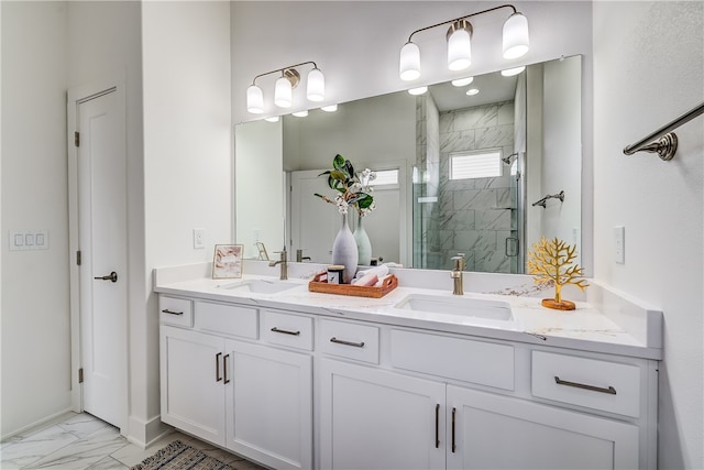 bathroom with a shower with door and vanity