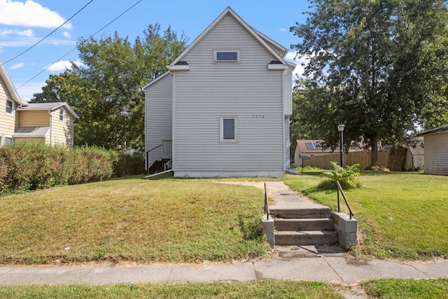 exterior space with a front lawn