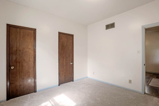 unfurnished bedroom with carpet