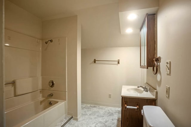 full bathroom with  shower combination, vanity, and toilet