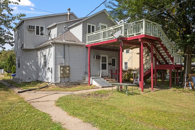 exterior space with a deck and a front lawn