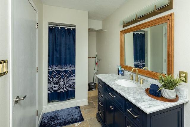 bathroom with a shower with curtain and vanity