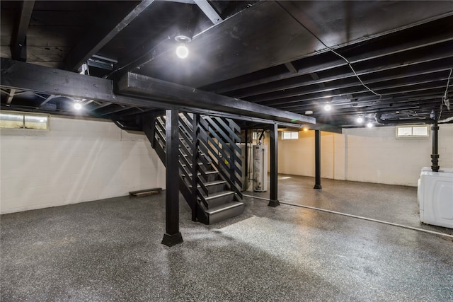 basement featuring washer / clothes dryer and gas water heater