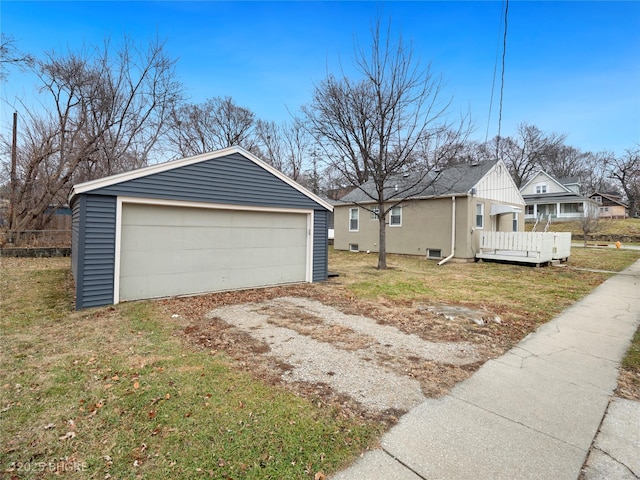 view of home's exterior with an outbuilding and a garage