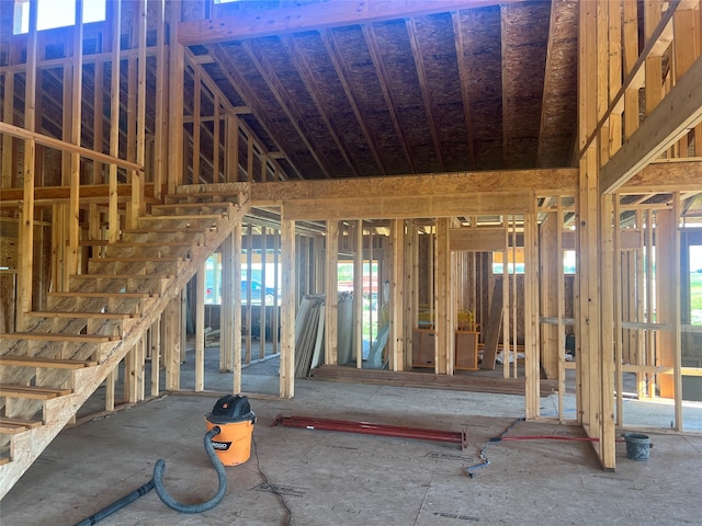 misc room with vaulted ceiling and a healthy amount of sunlight