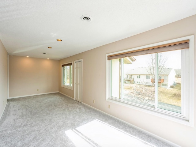 empty room with carpet floors