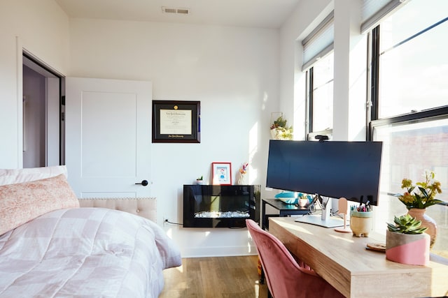 bedroom featuring hardwood / wood-style flooring