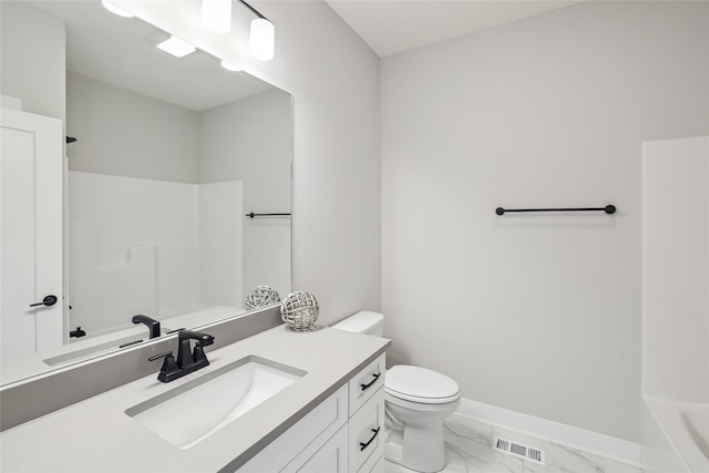 bathroom with vanity and toilet