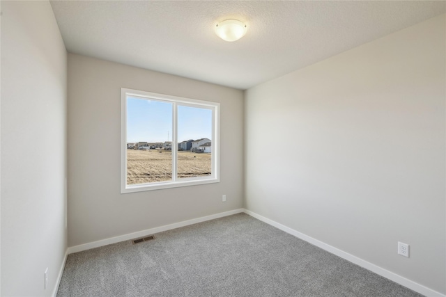 2105 White Oak Ln, Granger, IA 50109 - unfurnished room with carpet floors and baseboards