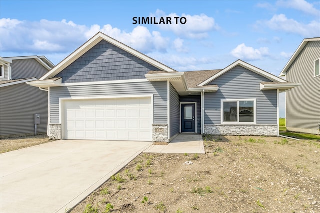 view of front of home with a garage