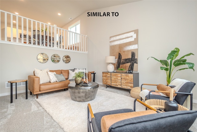 interior space featuring carpet floors and high vaulted ceiling