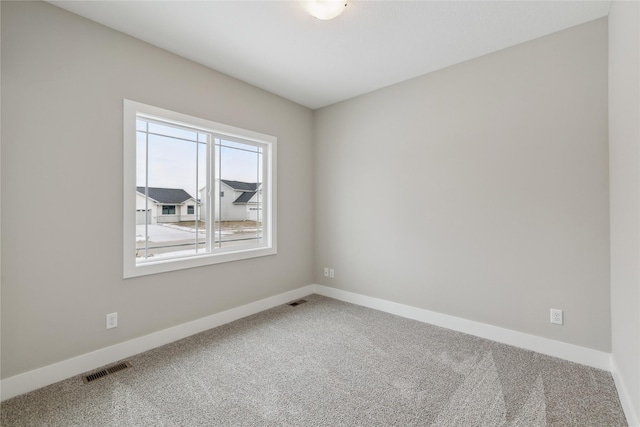 empty room featuring carpet