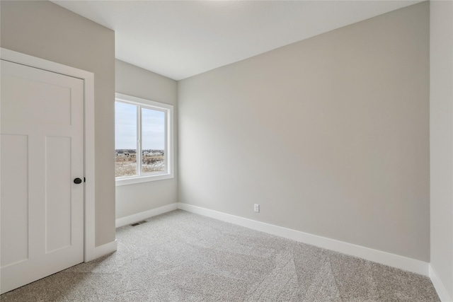 unfurnished bedroom with carpet flooring