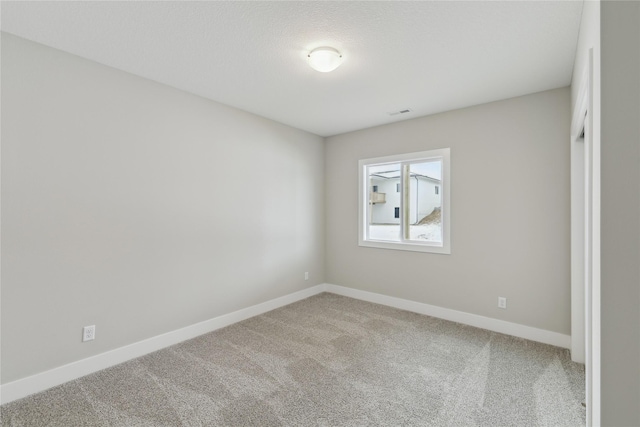 empty room featuring carpet