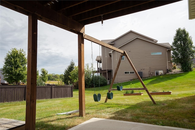 exterior space with a yard and central AC unit