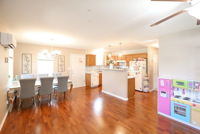 dining area featuring ceiling fan with notable chandelier, dark hardwood / wood-style floors, and a wall mounted air conditioner