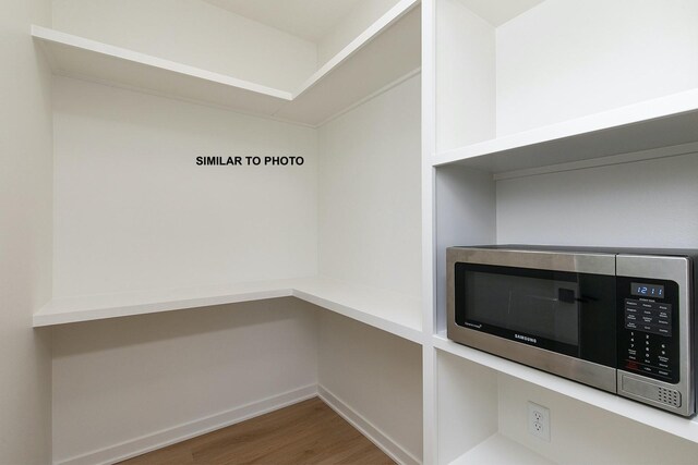 interior space with hardwood / wood-style flooring