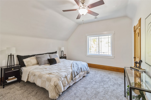 bedroom with carpet flooring, lofted ceiling, and ceiling fan