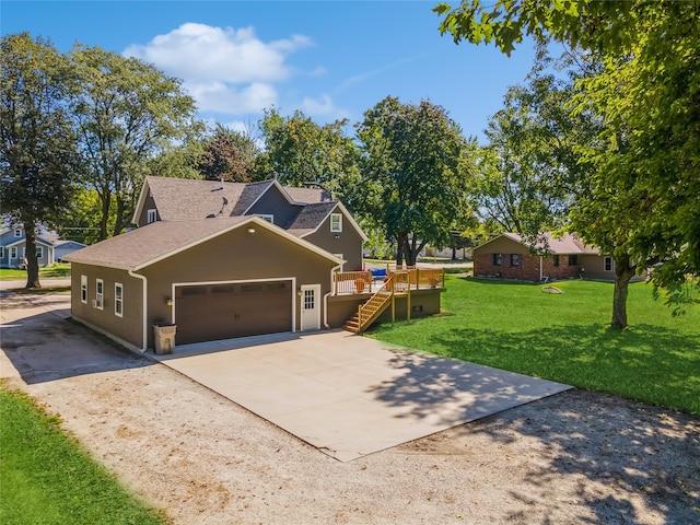 view of front of home with a garage and a front lawn