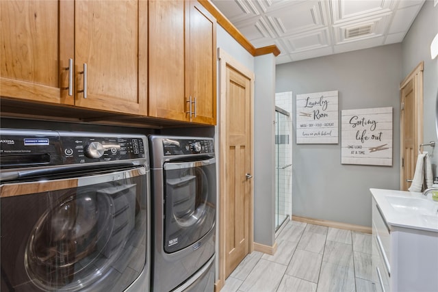 laundry room featuring sink and washing machine and dryer