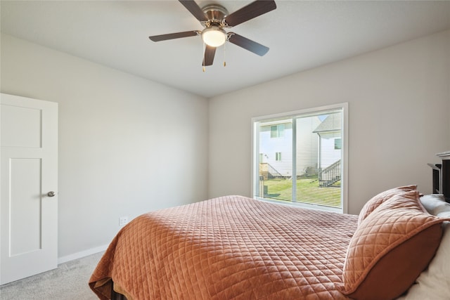 bedroom with light carpet and ceiling fan