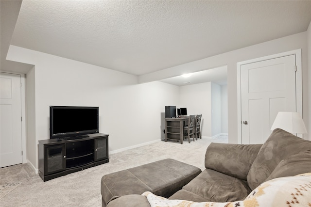 living room featuring a textured ceiling and light colored carpet